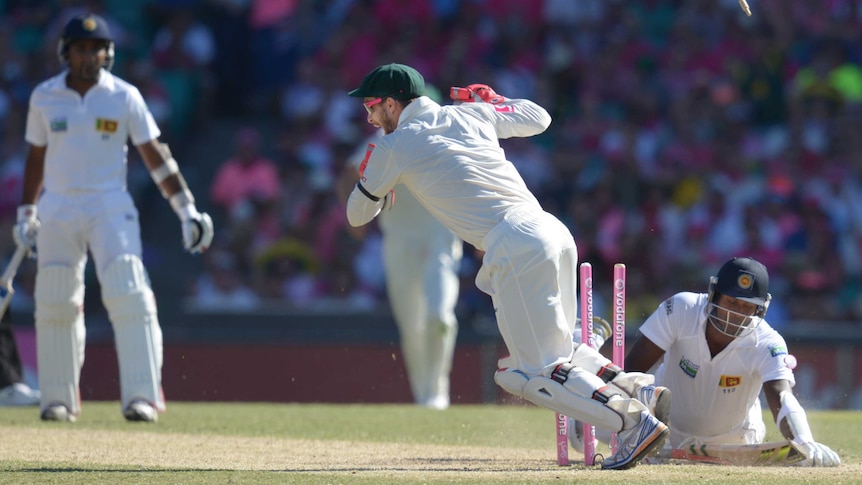 Caught short ... Angelo Mathews pays for a mix-up in the middle.