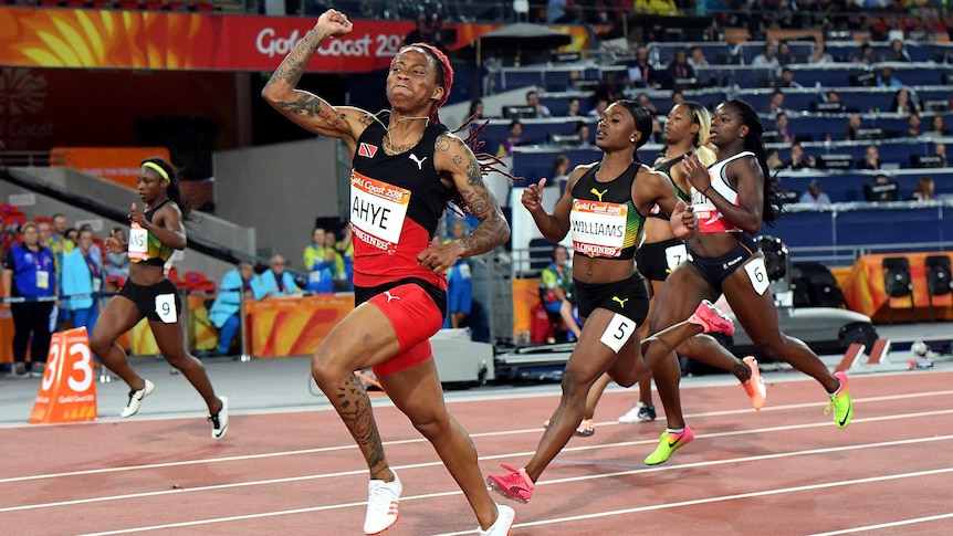 Michelle-Lee Ahye of Trinidad and Tobago wins the women's 100m at the Commonwealth Games.