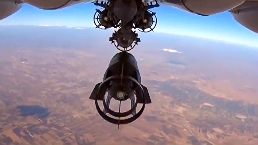 Russian Su-24M bomber dropping bombs in Syria