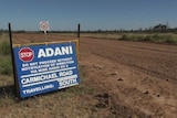 Sign outside the proposed Adani coal mine