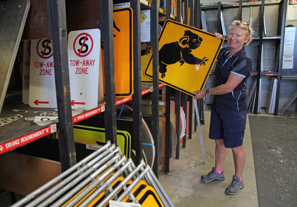 Signs of love: Local marks 26 years of making Gold Coast city signs ...
