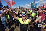Union members march to Webb Dock during an industrial action dispute in Melbourne, Friday, December 8, 2017.