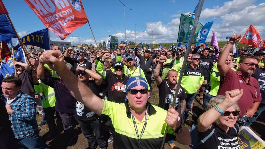 Union members march to Webb Dock during an industrial action dispute in Melbourne, Friday, December 8, 2017.