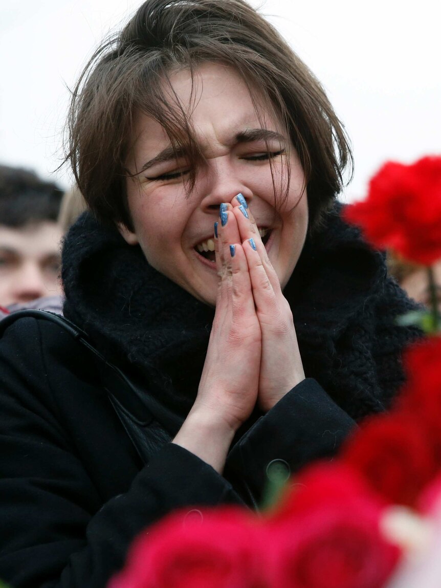 Woman cries at scene of Boris Nemtsov shooting
