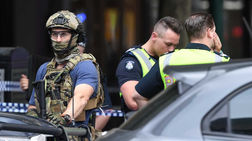 Police are seen at an incident on Bourke Street in Melbourne, Friday, November 9, 2018.