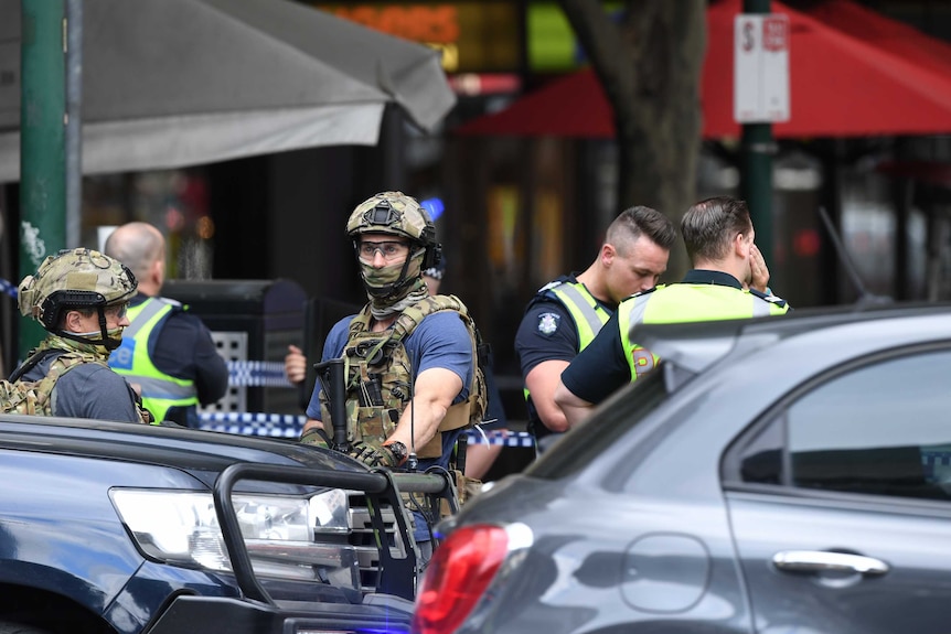 Police are seen at an incident on Bourke Street in Melbourne, Friday, November 9, 2018.