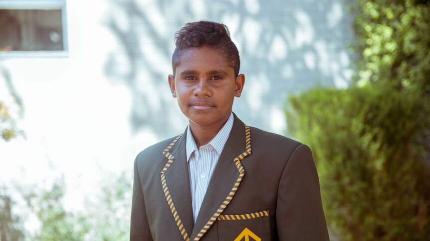 Junior Dirdi in school uniform