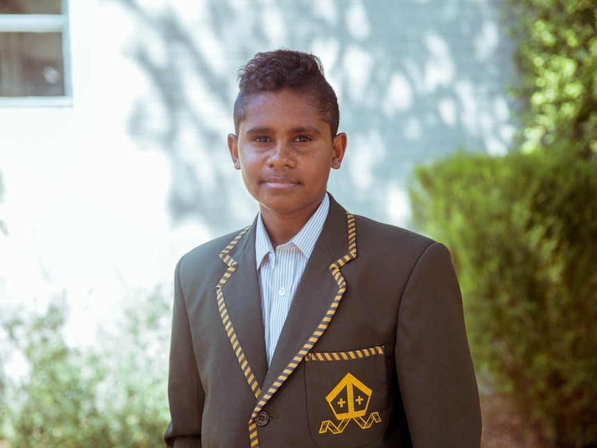 Junior Dirdi in school uniform