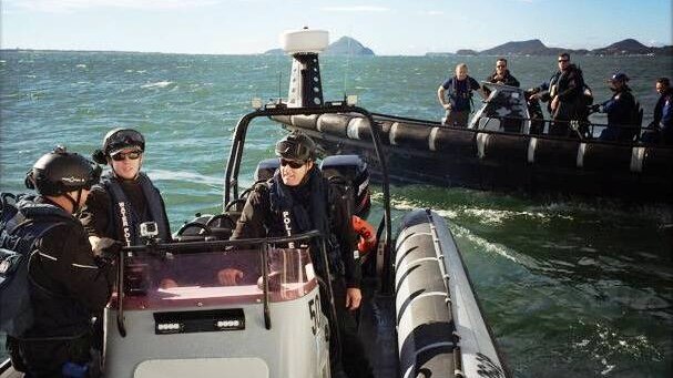 Police taking part in Operation Viper,  a training exercise at Port Stephens.