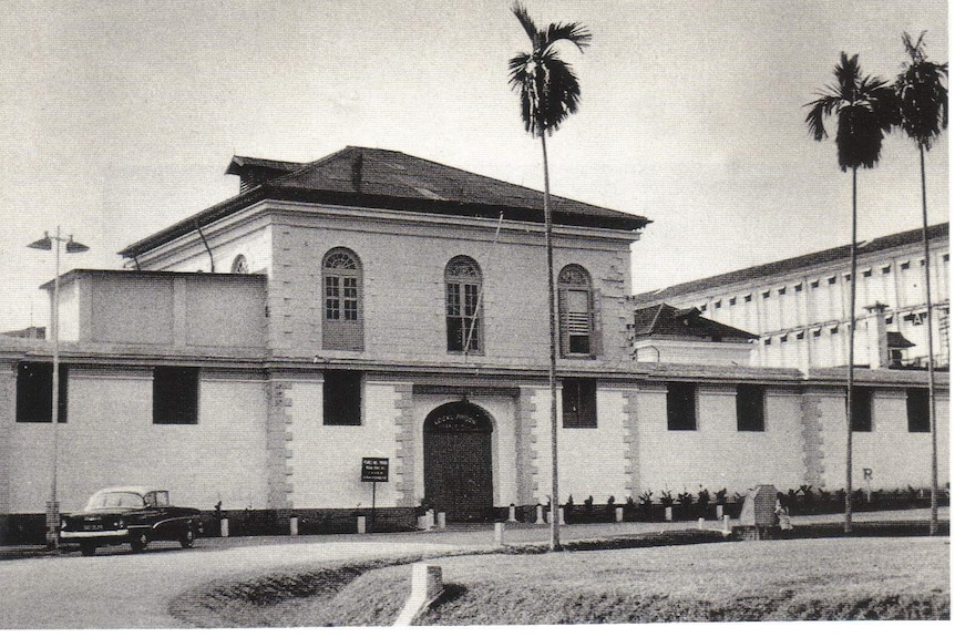 A black and white photo of the Outram Rd Jail building in Singapore.