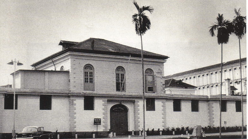 A black and white photo of the Outram Rd Jail building in Singapore.