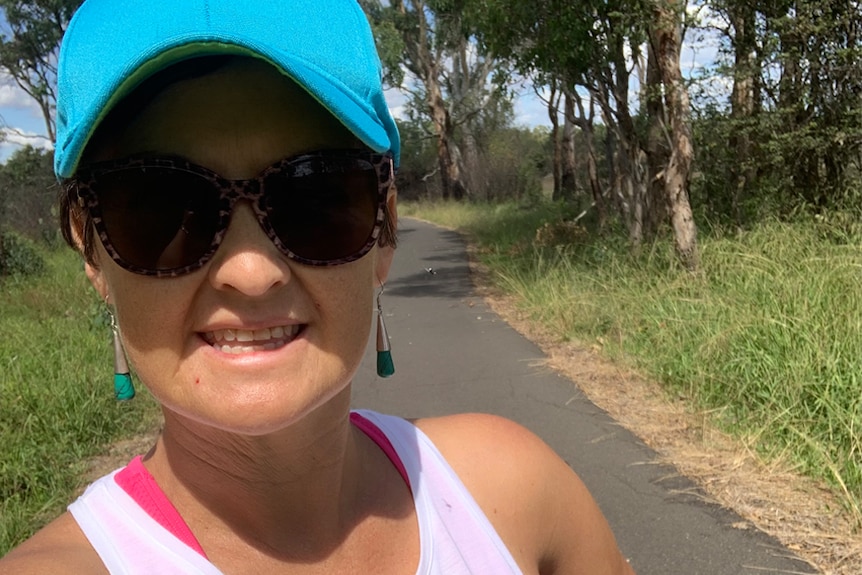 Karrin Clarke, in sunglasses, during her morning walk