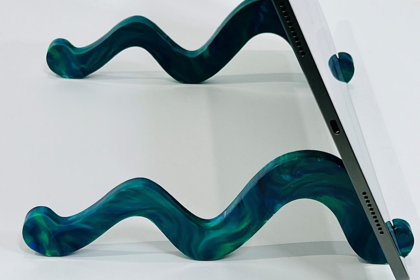 A wavy device stand.