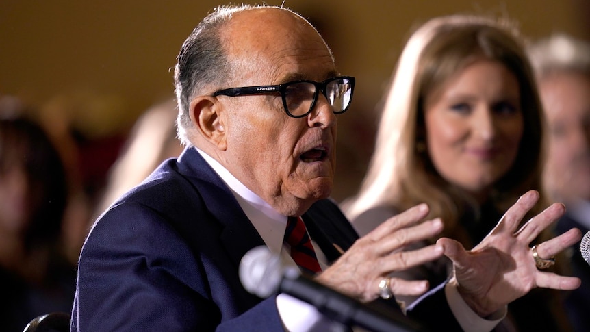 Federal investigators raid Rudy Giuliani's New York apartment, seize electronic devices