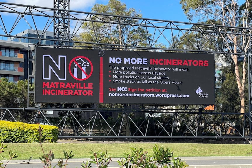 An electric sign reading 'no more incinerators'
