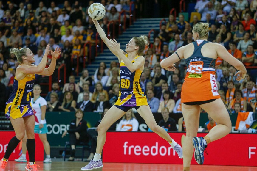 The Lightning's Karla Mostert works in defence against the Giants in the grand final.