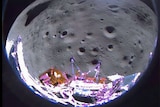 A close up photo taken by a lunar lander near the surface of the Moon