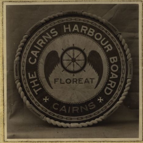 An aged photograph of The Cairns Harbour Board plaque.