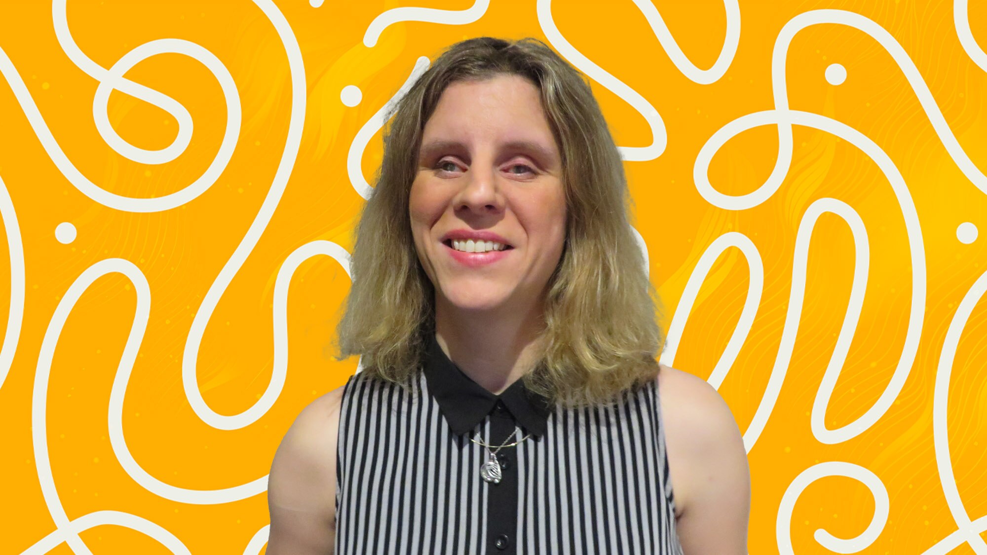 Jordie Howell smiles at the camera. She has mid-length blonde hair & wears a black & white striped top. The background is yellow