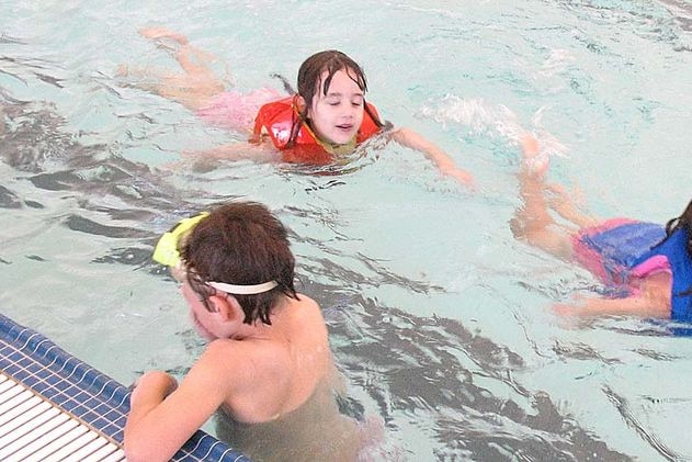 children swimming