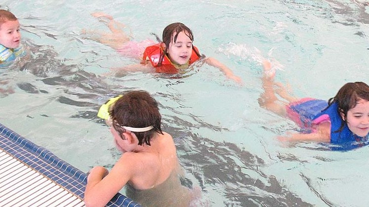 children swimming