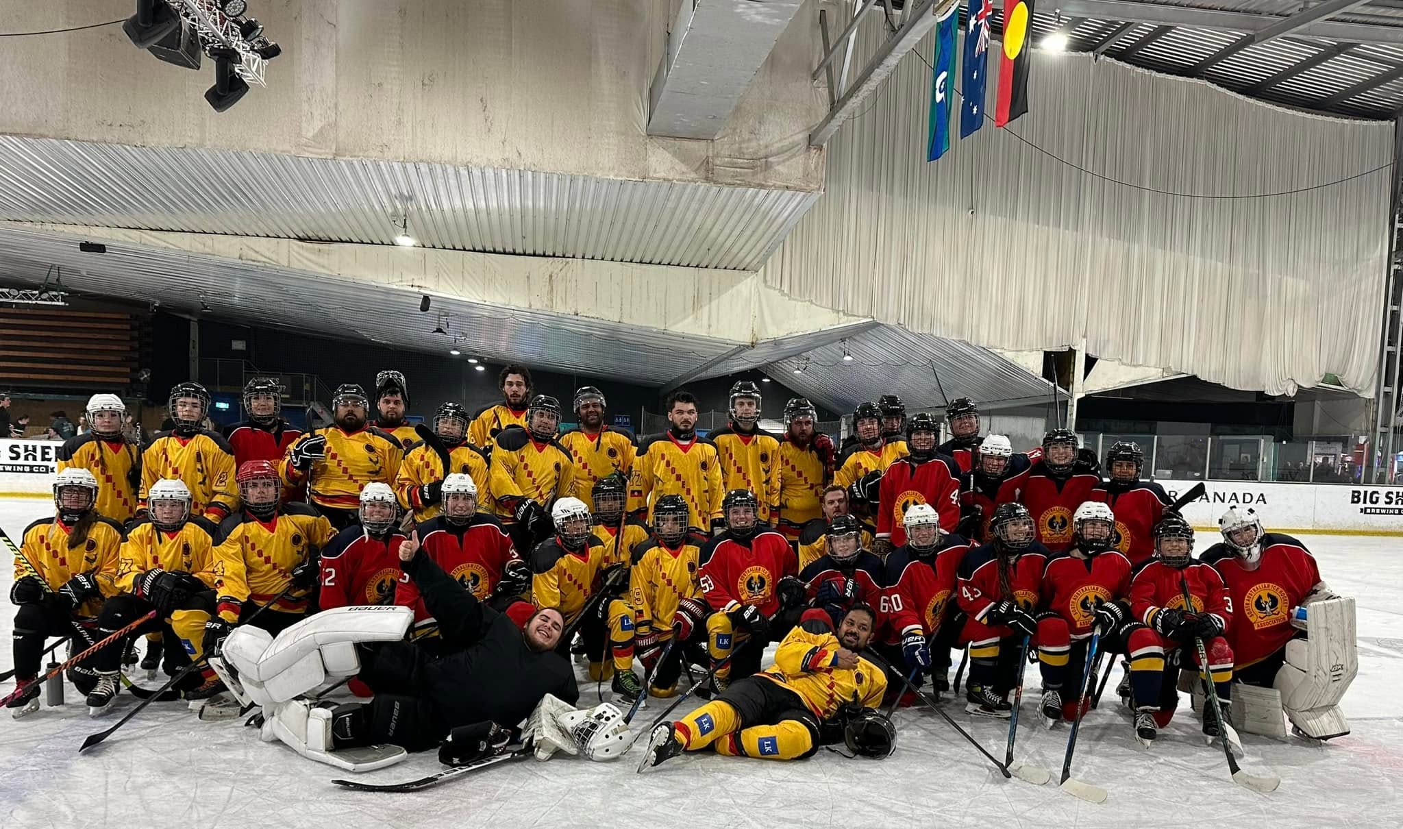 A group photo of an ice hockey team.