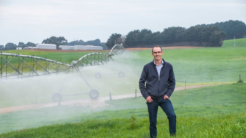 Dr James Hill with an automated irrigation system