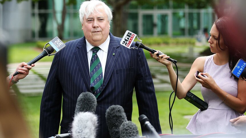 Clive Palmer speaks to the media during a press conference at Parliament House in Canberra.