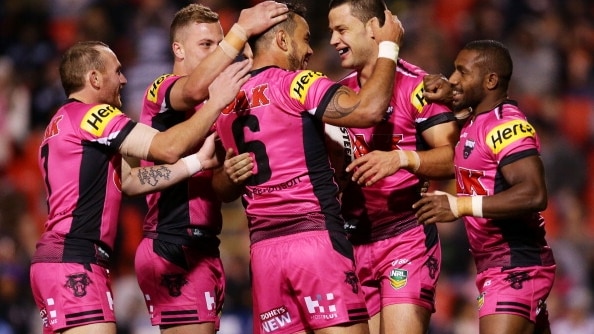 Isaac John celebrates with the Panthers after scoring against Warriors