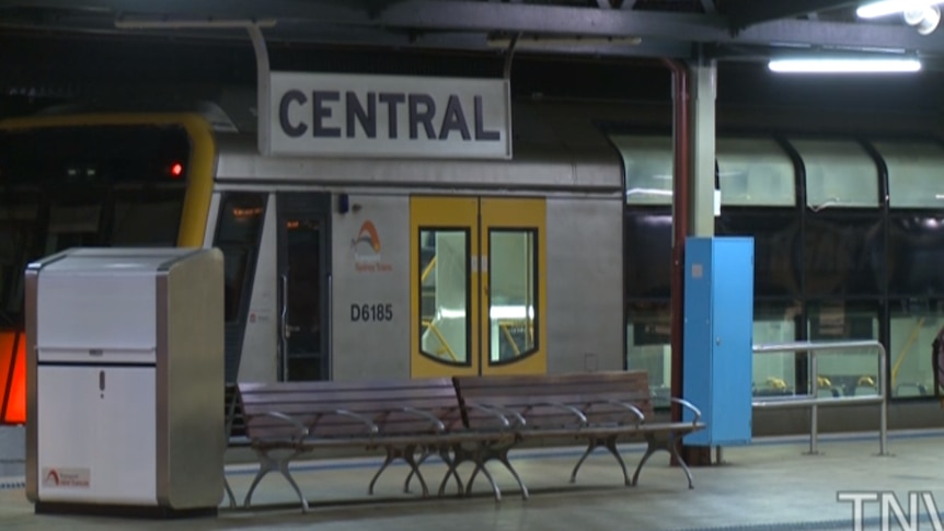 An empty train waits at a platform