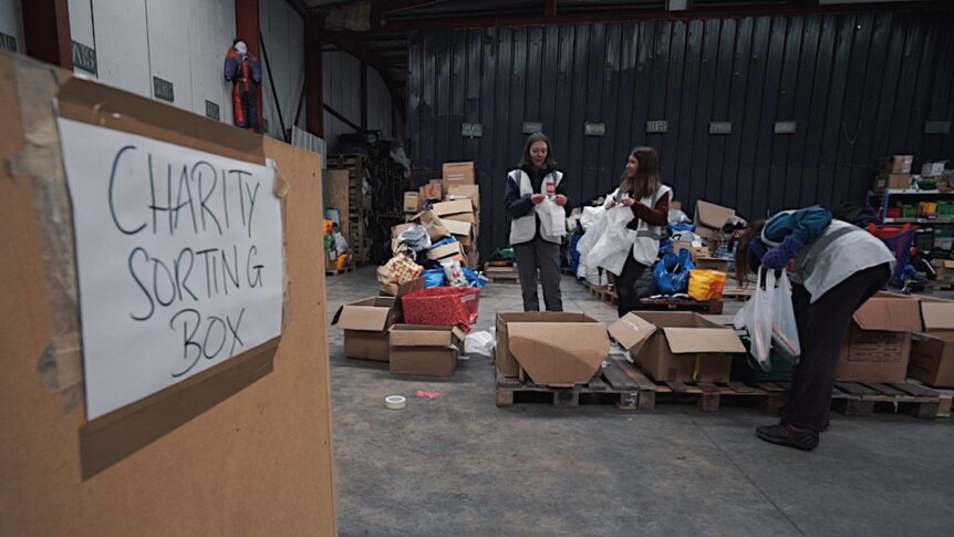 Volunteers at the Care4Calais warehouse in Calais.