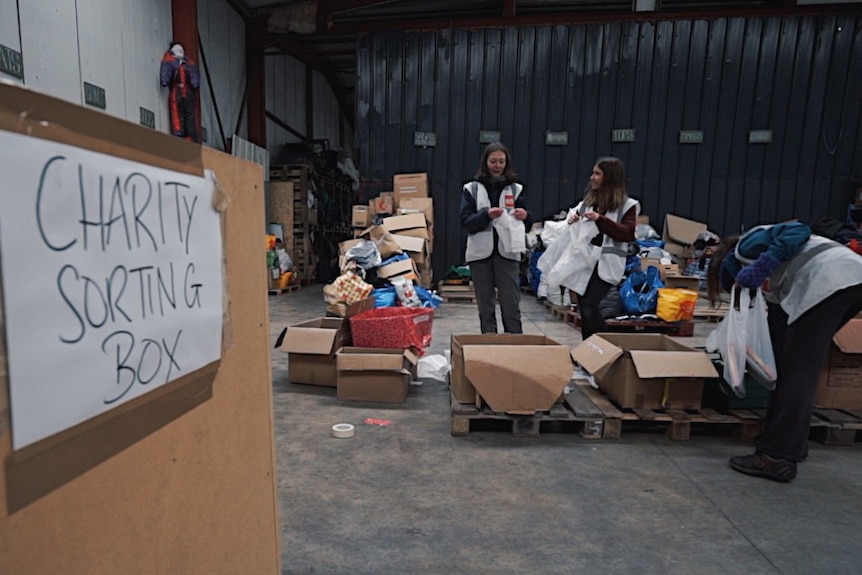 Volunteers at the Care4Calais warehouse in Calais.