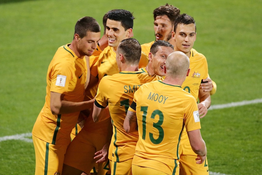 Socceroos celebrate a Tomi Juric goal against Iraq