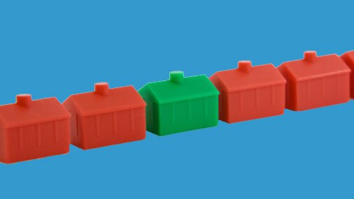 A row of Monopoly houses stand in a line (Thinkstock)