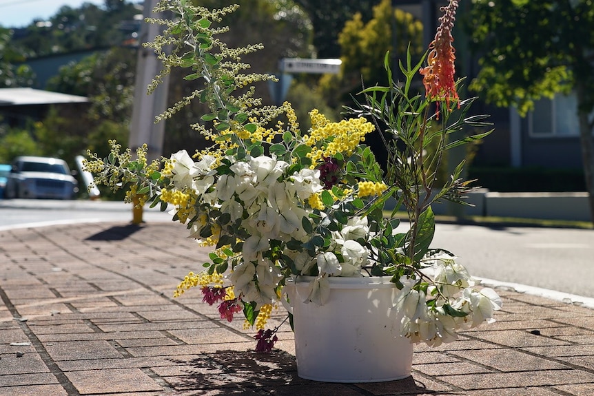 A bunch of flowers was left outside Kerry Rooney's home in Newmarket.