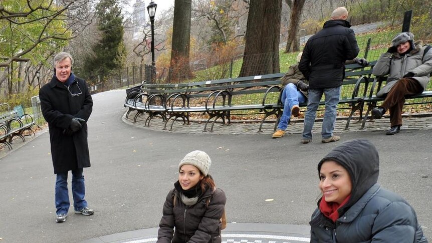 Visitors take photographs at the Imagine marble mosaic in Strawberry Fields