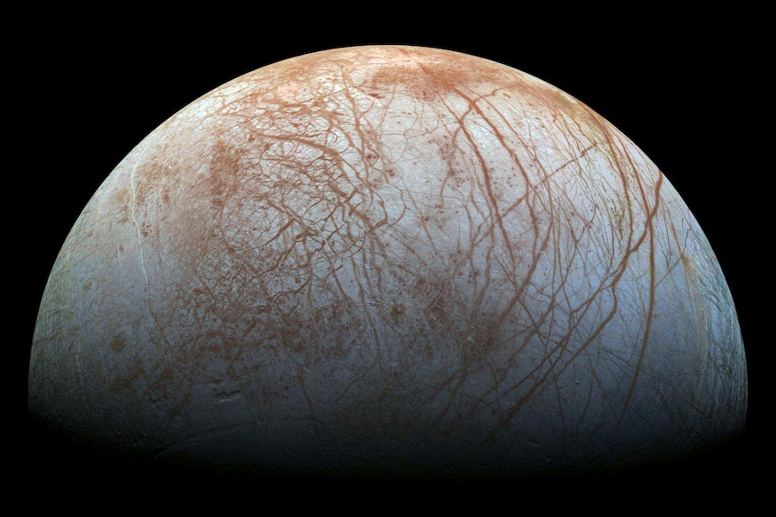 A close-up partial image of Jupiter moon Europa.