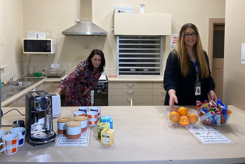 Two women work in a kitchen