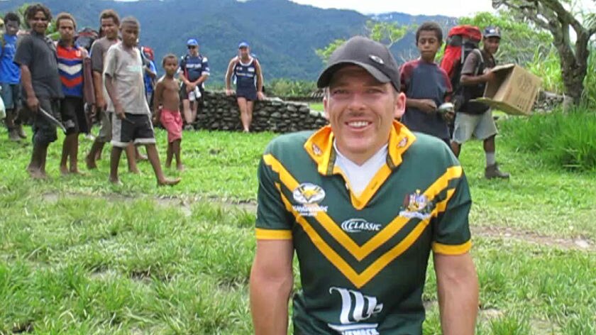 Kurt Fearnley poses for the cameras before beginning his 96km crawl along the Kokoda Track in 2009.
