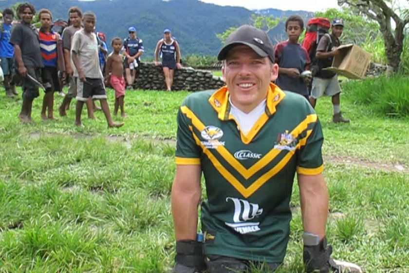 Kurt Fearnley poses for the cameras before beginning his 96km crawl along the Kokoda Track in 2009.