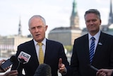Malcolm Turnbull speaks to the media with Matthias Cormann in Hamburg ahead of the G20.