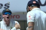 TV still of Steve Smith celebrating in front of Virat Kohli