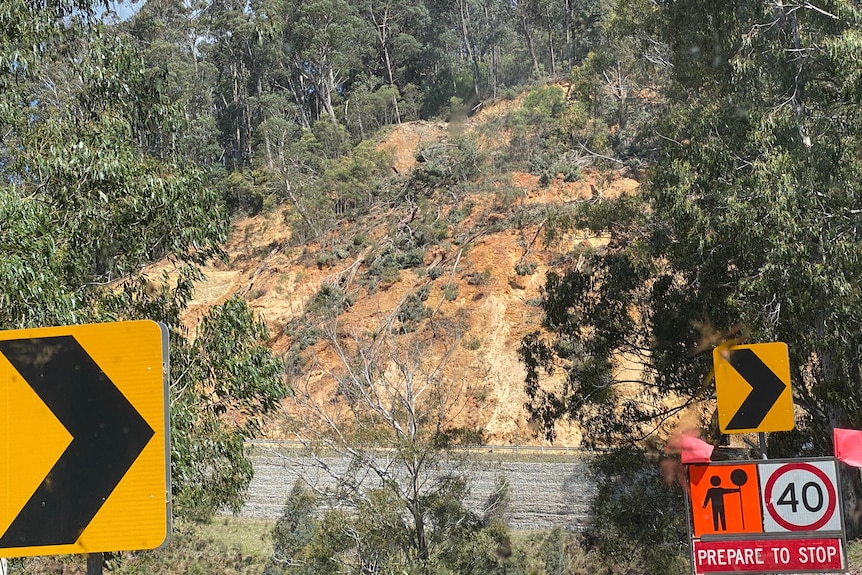 Landslide over a sealed road.