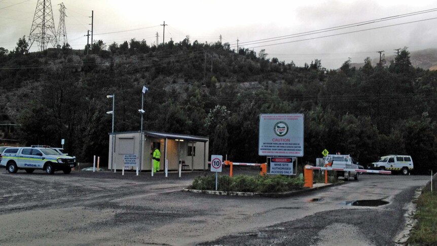 Mine inspectors have returned to the mine site where two men died after falling down a shaft.