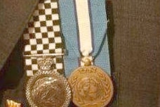 The service medals bought online pinned onto Barry Urban's jacket