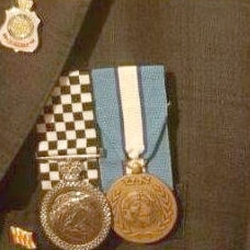 The service medals bought online pinned onto Barry Urban's jacket