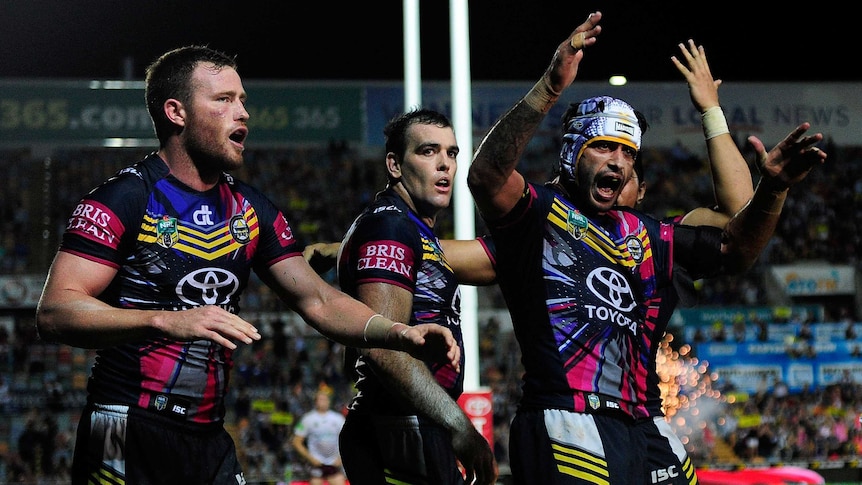 Cowboys celebrate Gavin Cooper's winning try against Manly