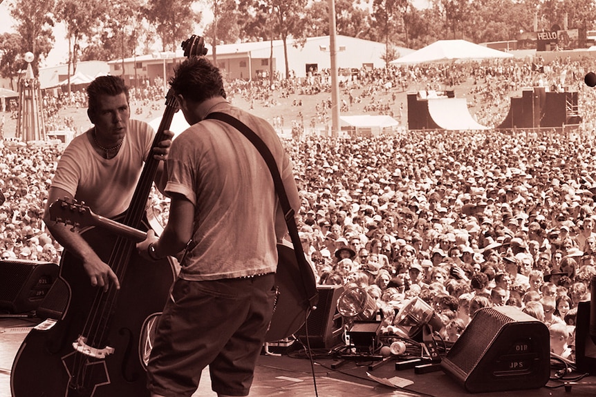 Scott Owen and Chris Cheney of The Living End playing on stage at the 1999 Big Day Out