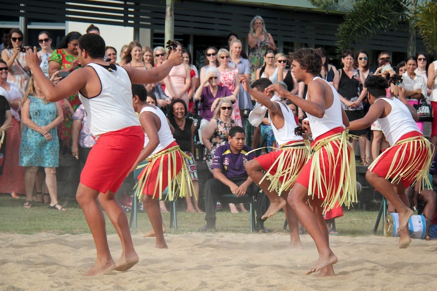 Torres Strait Islander footballers boarding at AFL Cape York House perform during a recent fundraiser against domestic violence.