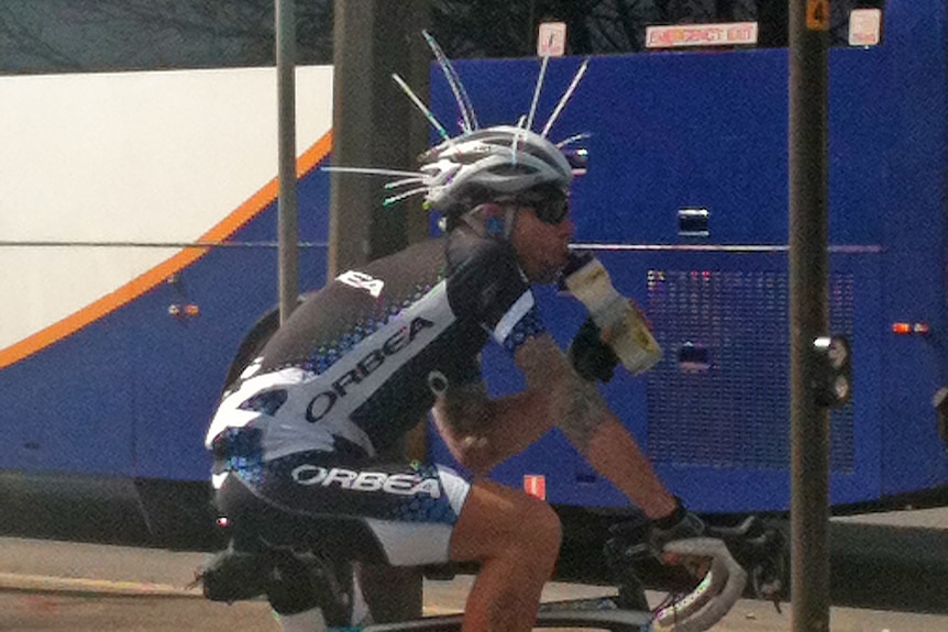 Zip ties used on a helmet to try to stop magpies swooping.